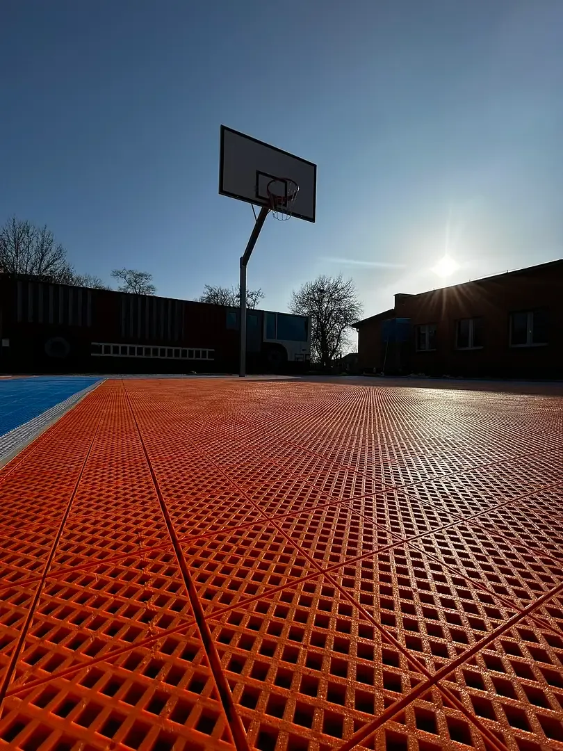 Outdoor basketball court surface, NOCERO polypropylene tiles close-up